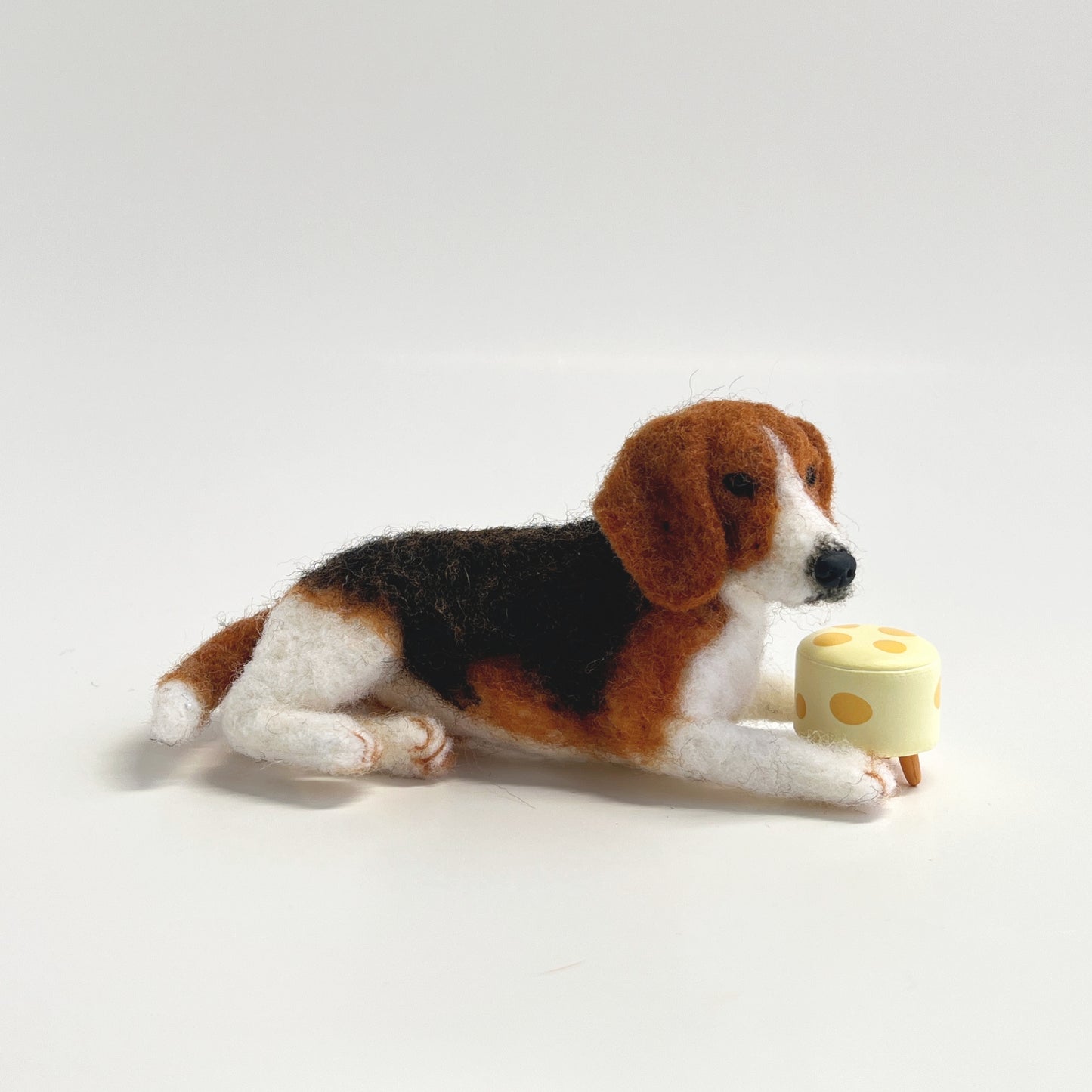 Miniature needle felted Beagle lie down_front view with stool